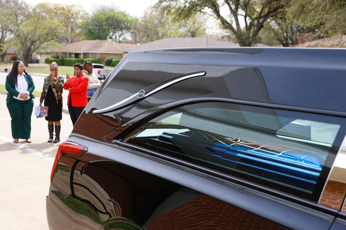 The casket of the late Legend Chappell remains in the hearse after a funeral service on...