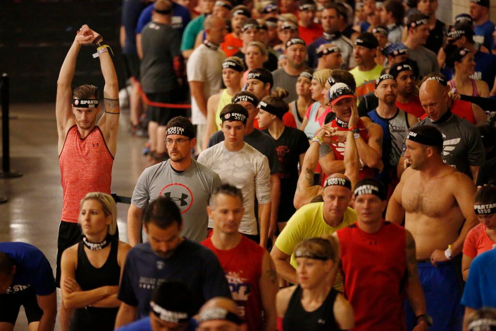 Dallasites take on obstacles during the Spartan Race at AT&T Stadium