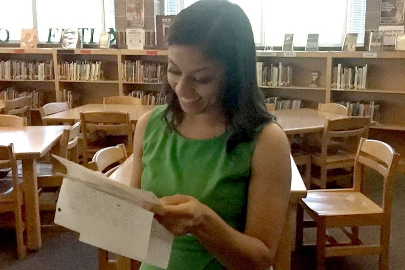 Norma Rodriguez, now 24 and a Dallas ISD teacher, reads a letter she wrote that was placed...