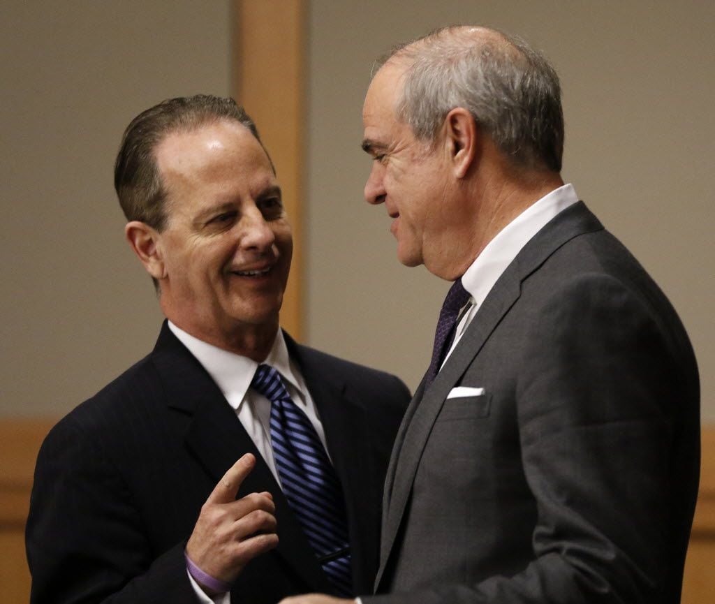 Philip Hilder, attorney for Texas Attorney General Ken Paxton, right, talks with special...