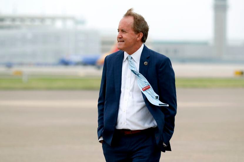 In this June 28, 2020 photo, Texas Attorney General Ken Paxton waits for the arrival of Vice...