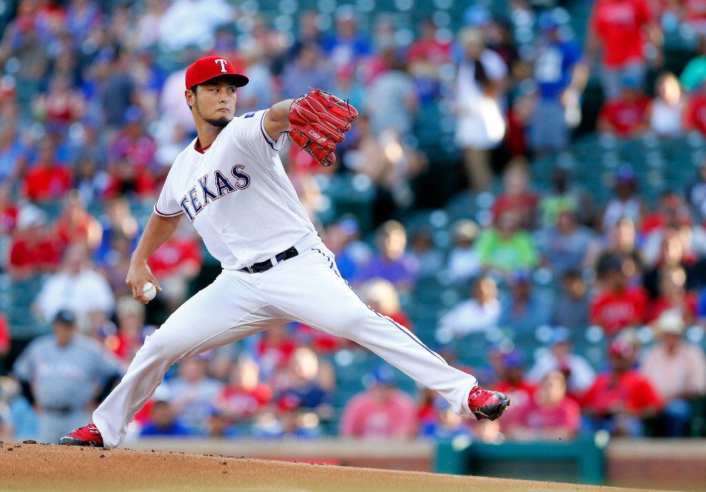 Texas Rangers starting pitcher Yu Darvish throws against the Miami Marlins in the first...