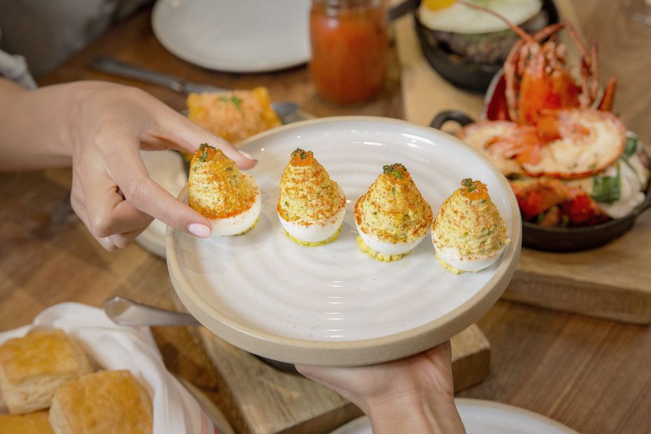 Yardbird Southern Table & Bar, opening in Dallas in 2020, serves deviled eggs on its brunch, lunch and supper menus. They come with dill, chives and smoked trout roe. 