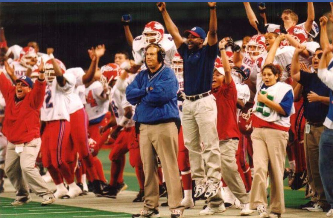 The Duncanville sideline celebrates as the Panther defense makes a key stop during the 1998...