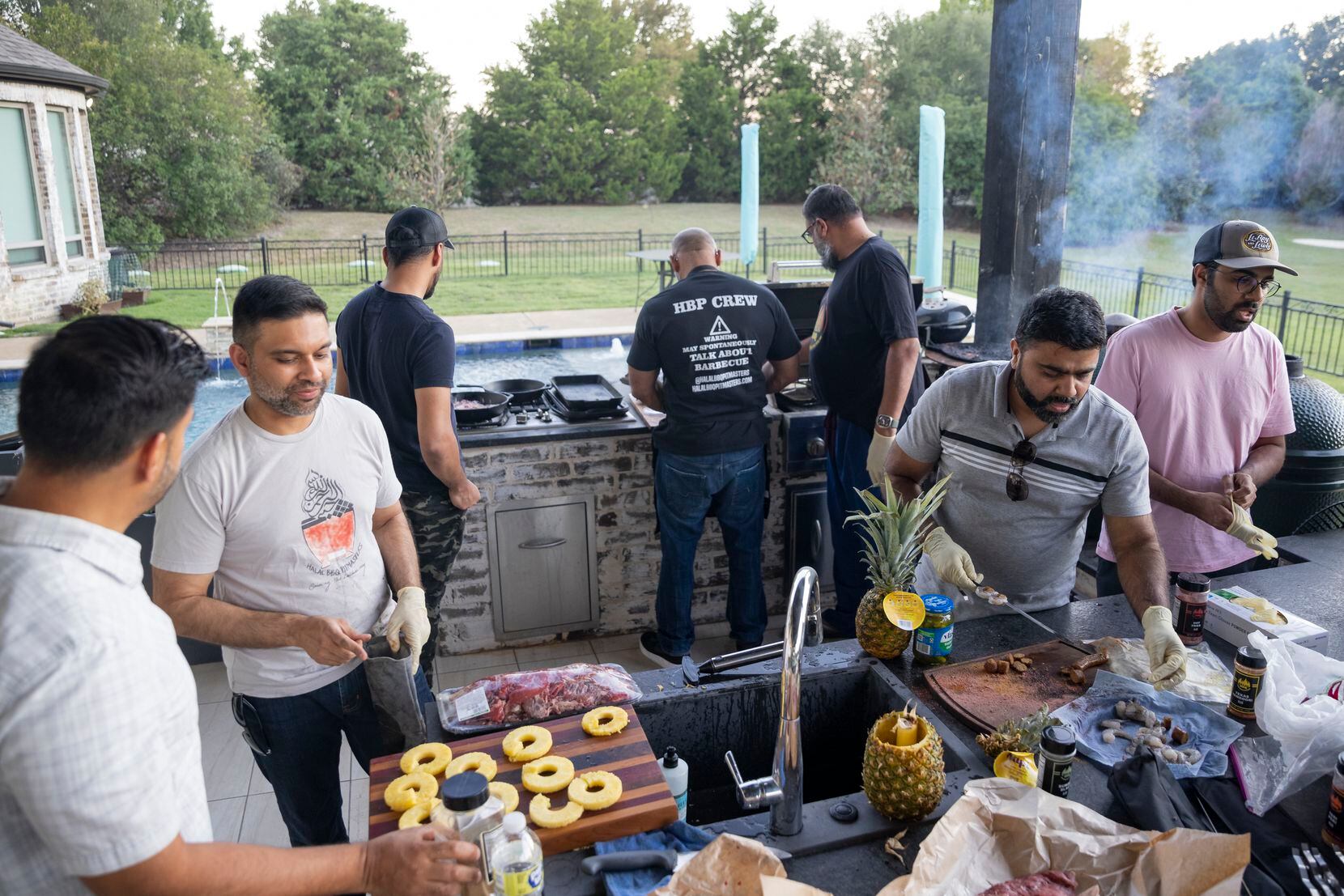 The Halal BBQ Pitmasters group experiments with new recipes on Tuesday, Sept. 27, 2022, at...