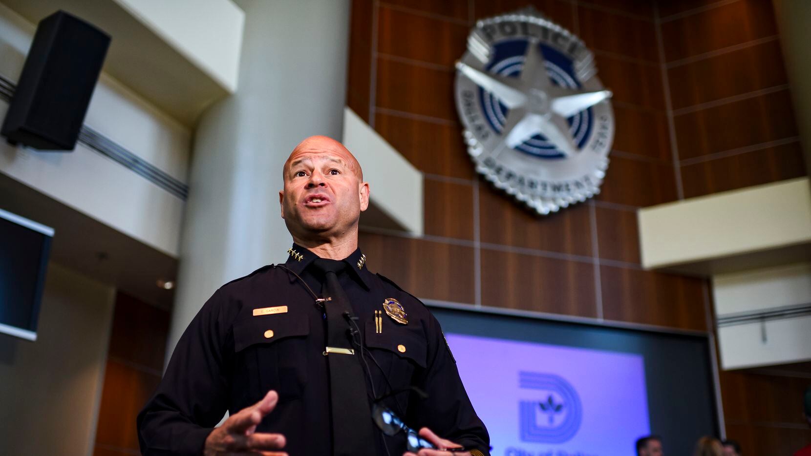 Dallas Police Department Chief, Eddie Garcia, takes questions from reporters during a press...