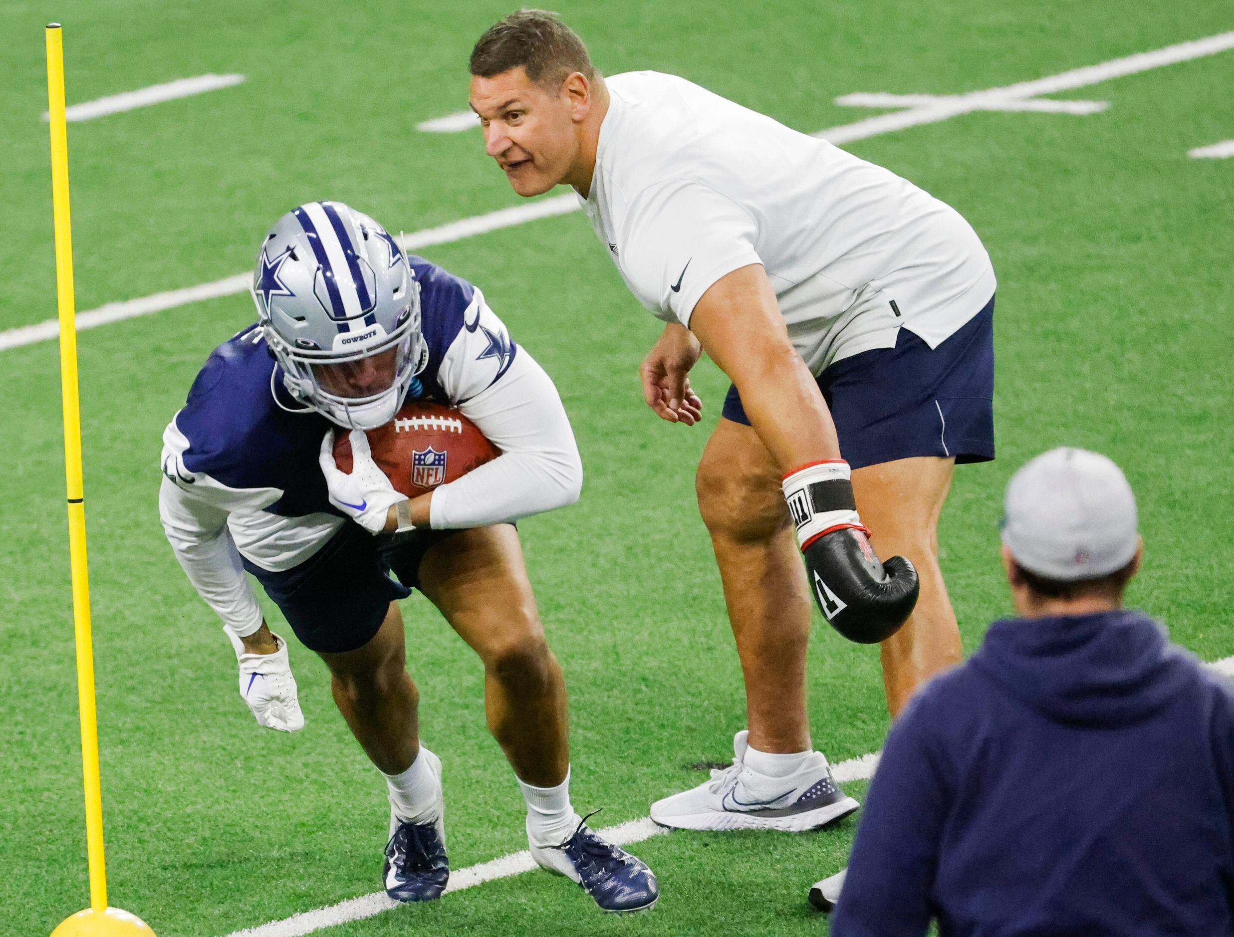 Dallas Cowboys safety Tyler Coyle (31) takes part in a drill during a mini camp session at...