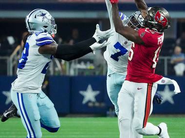Dallas Cowboys cornerback Trevon Diggs (7) breaks up a pass intended for Tampa Bay...