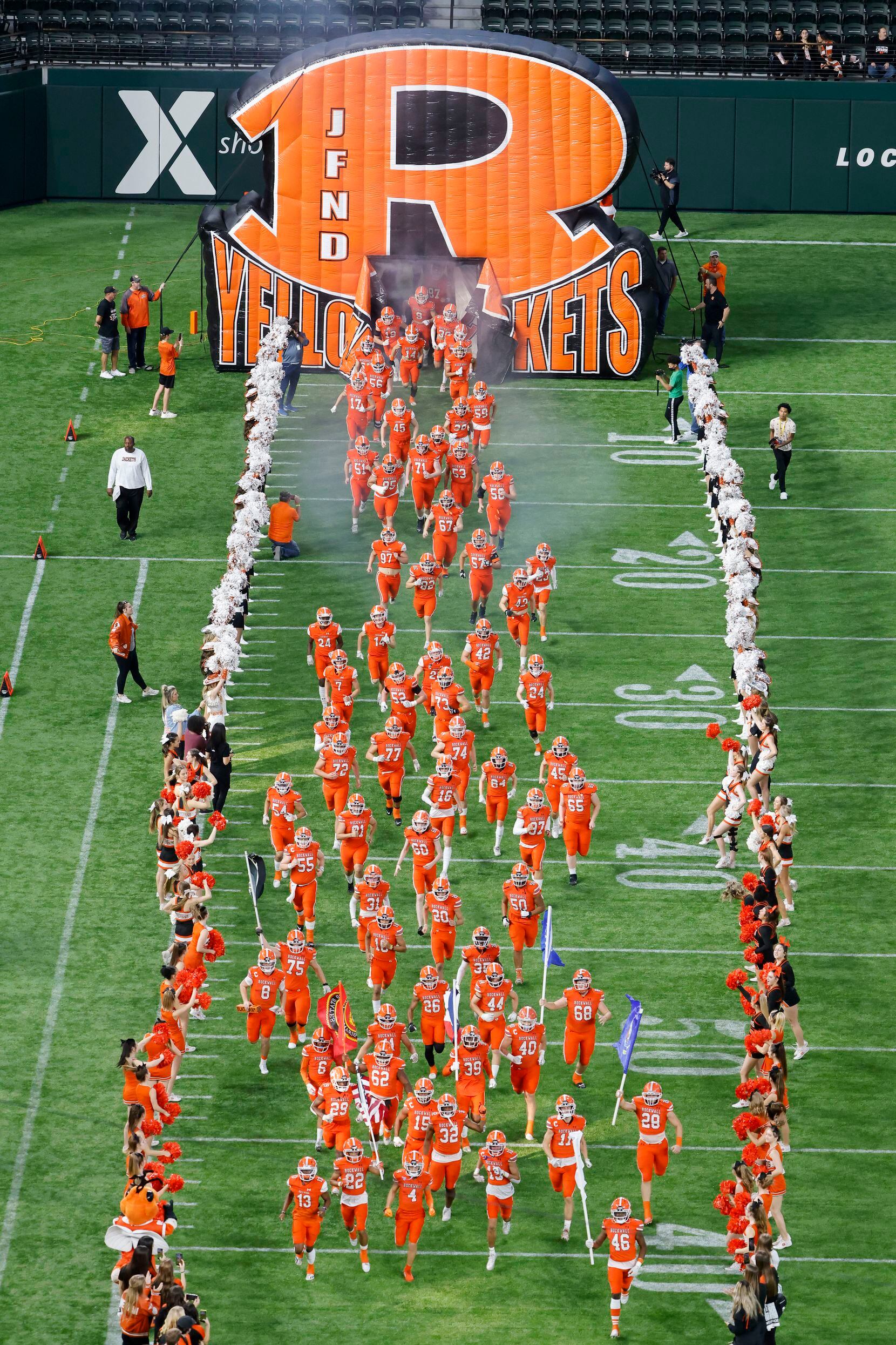 Rockwall players end the field as they prepared to play DeSoto during the Class 6A Division...