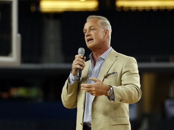 Former Dallas Cowboys player Daryl Johnston speaks during the Reese's Final Four Slant Celebration at AT&T Stadium in Arlington, on Friday, April 4, 2014.