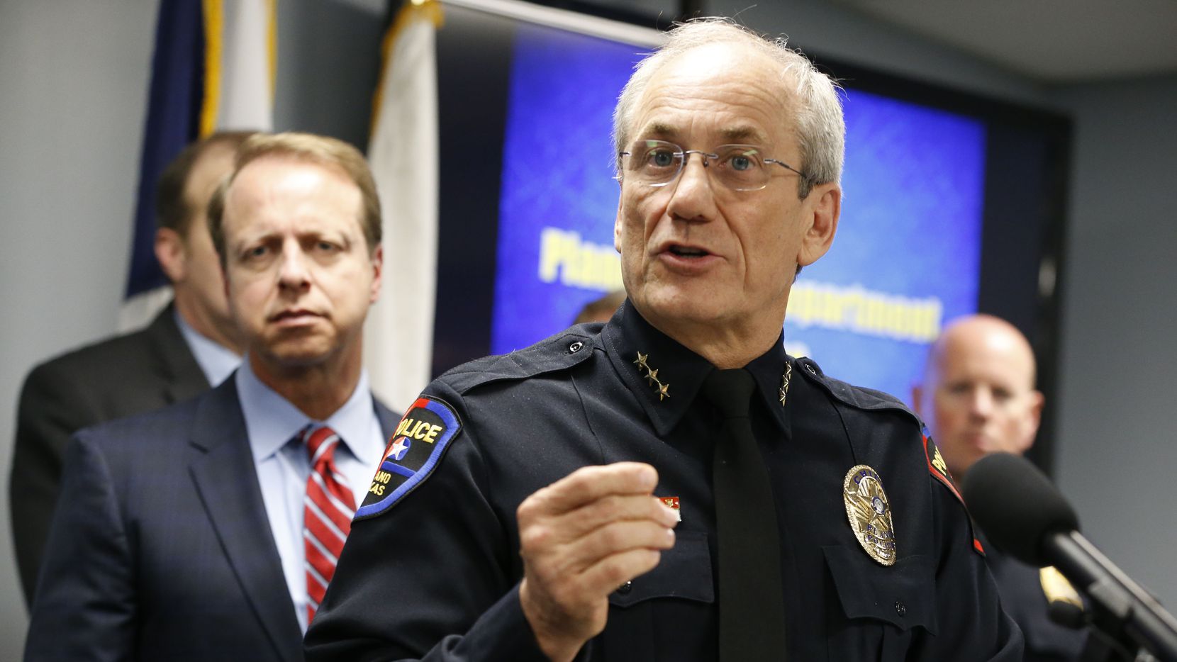 Plano Police Chief Gregory W. Rushin answers questions during a news conference Friday after Billy Chemirmir, 45, was arrested on charges of capital murder and attempted capital murder involving elderly women victims.