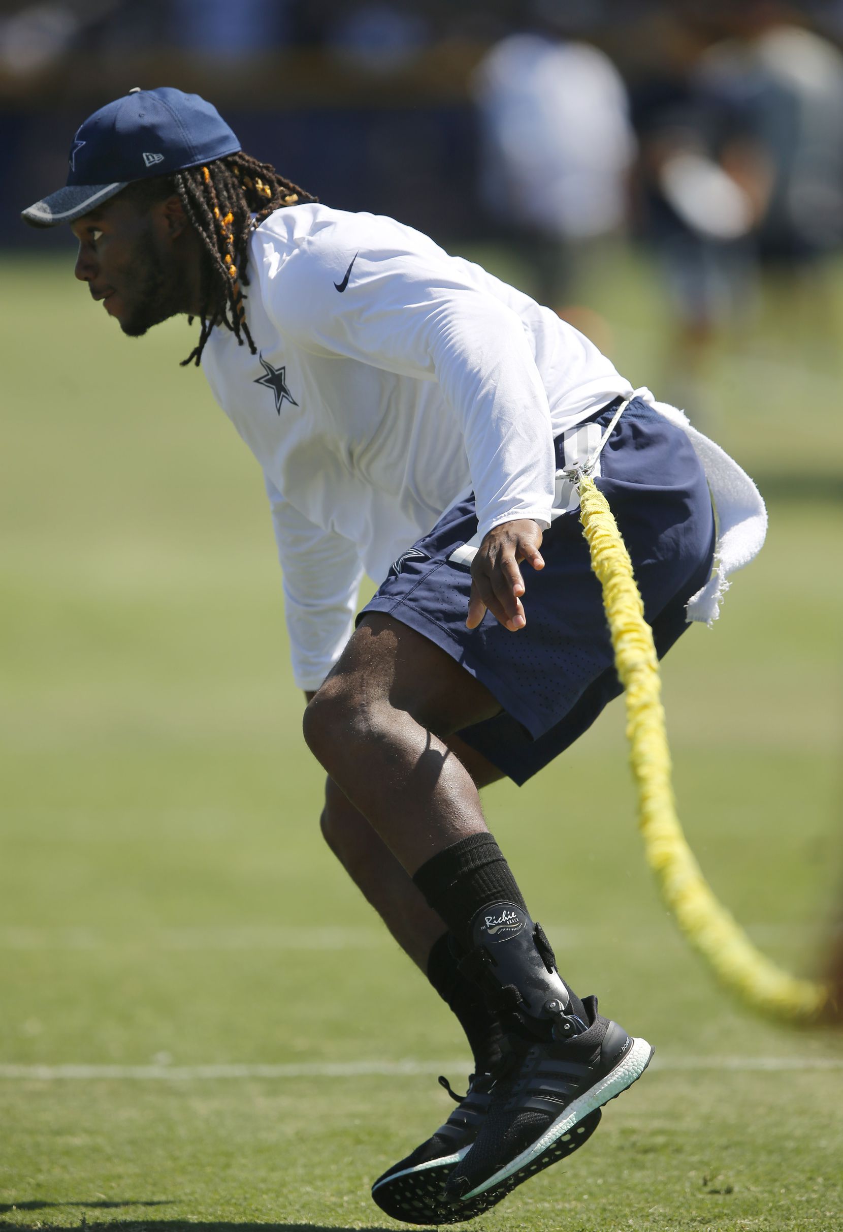 Dallas Cowboys rookie outside linebacker Jaylon Smith works out with a bungee as he is...