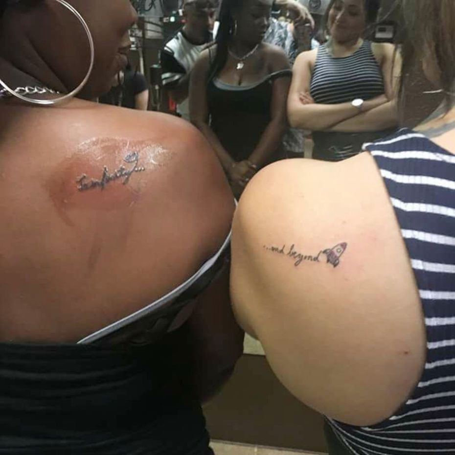 Myah Bass, (left), 28, and a friend, Celina Butt, got completmentary tattoos.