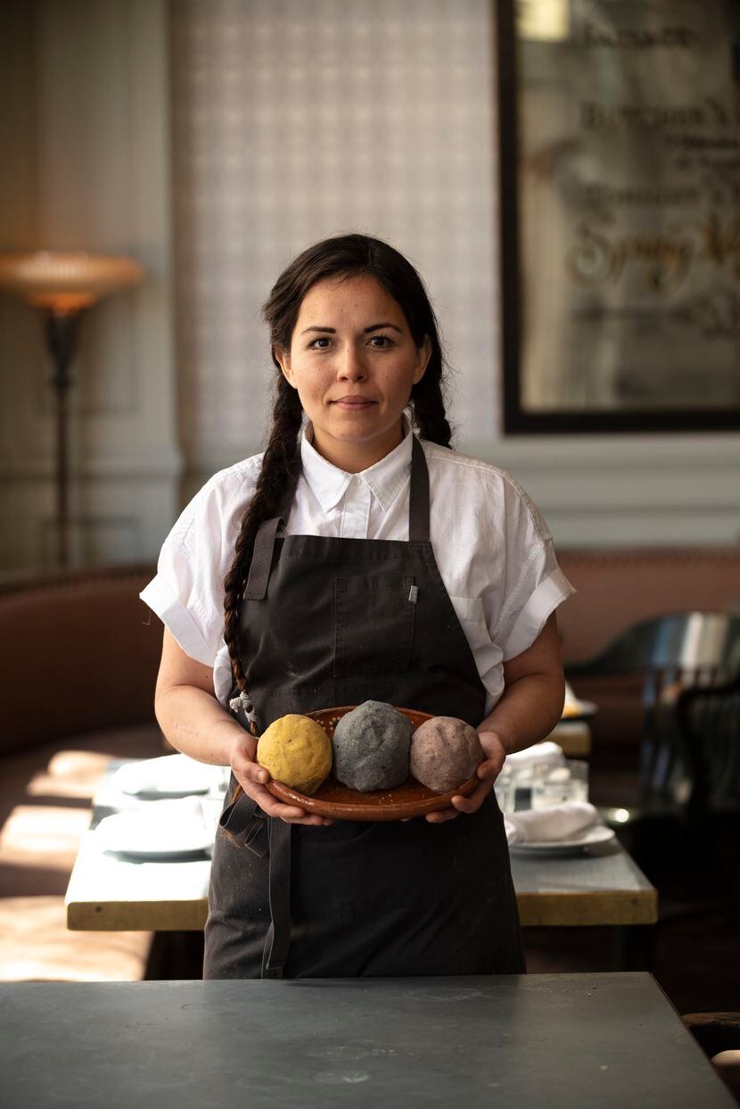 Chef Olivia Lopez in Dallas with hand-made balls of heirloom corn masa 