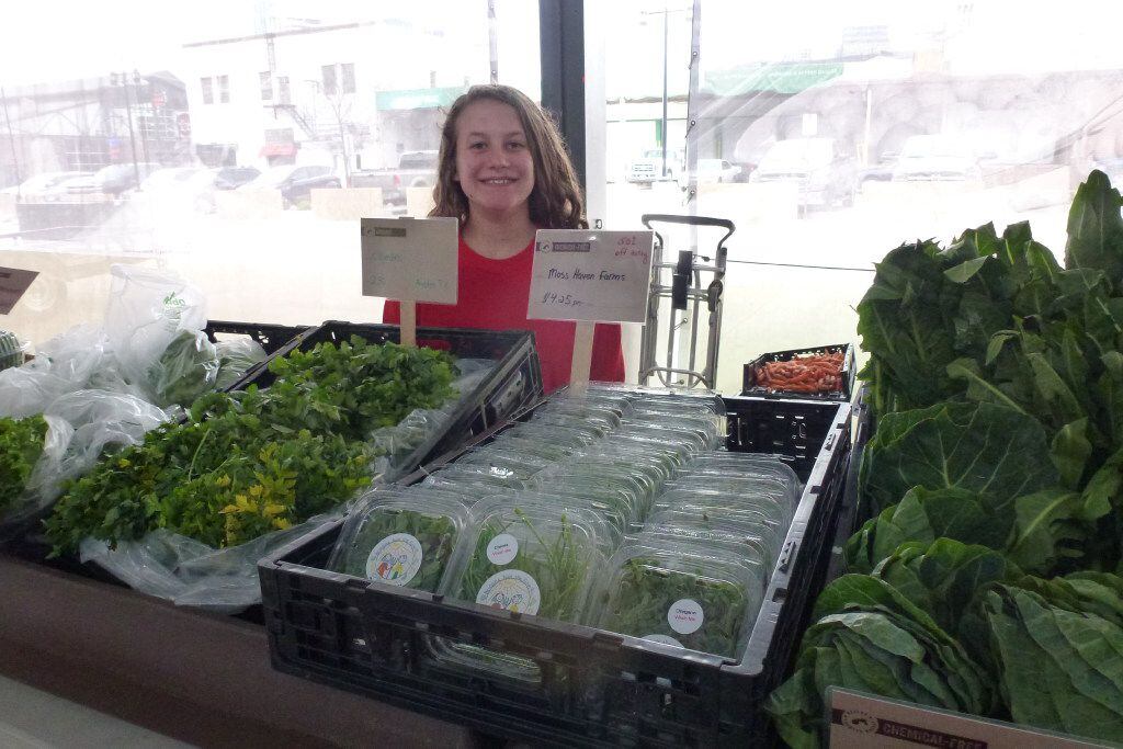 Josslyn Julka sells produce from various farms for her dad Chad Julka's Market Provisions at...