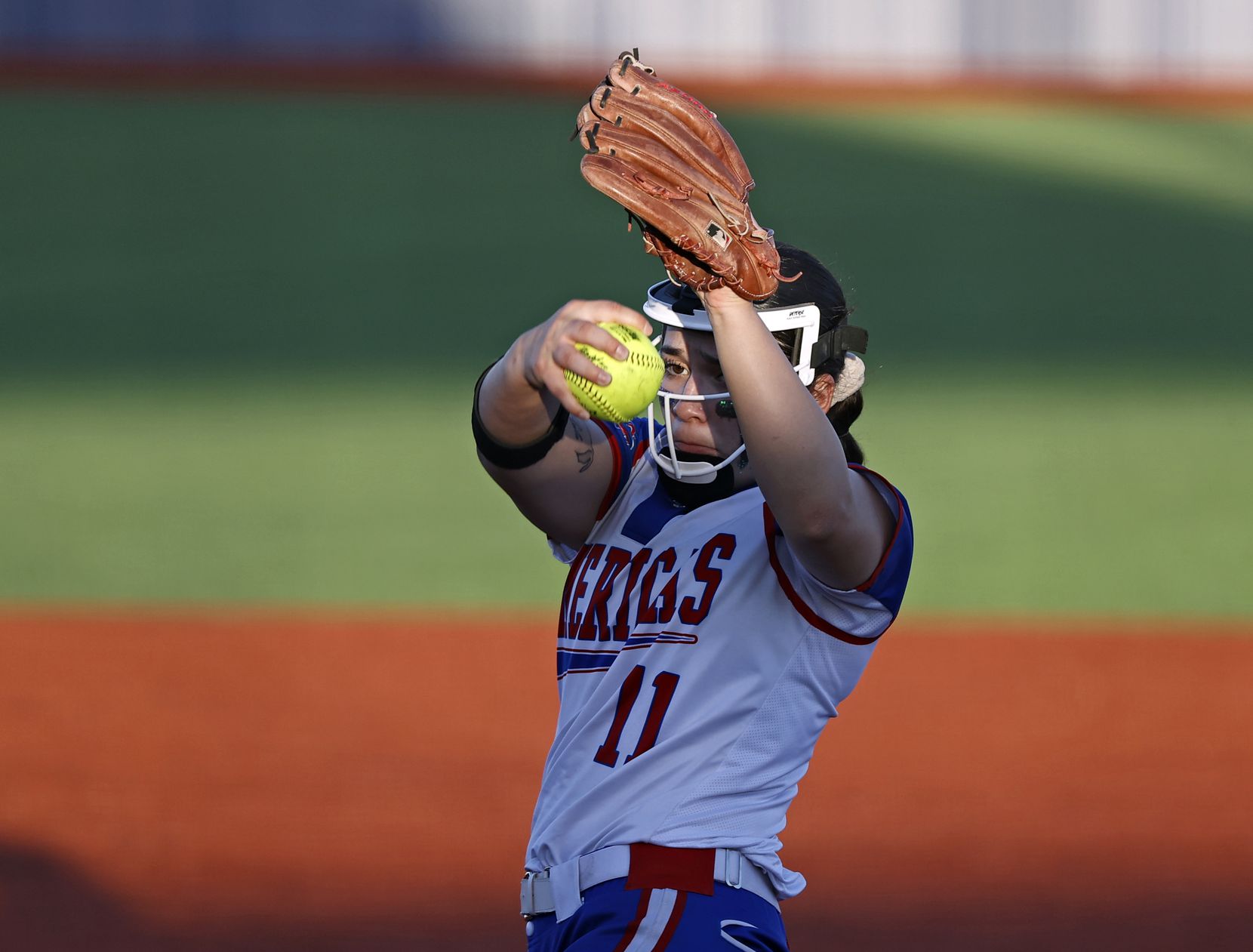 El Paso Americas' Mia Perez (11) pitches the ball during the game against Flower Mound...