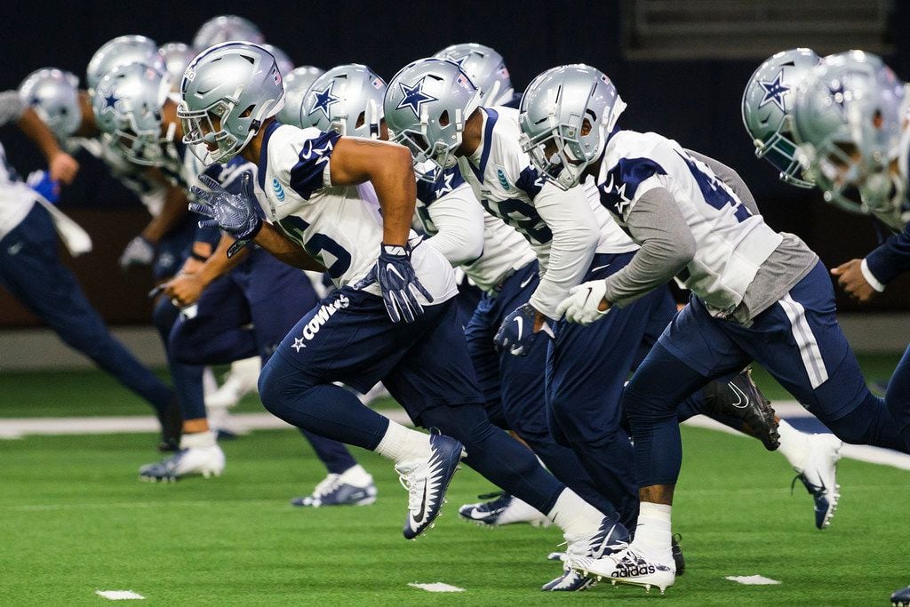 Dallas Cowboys running back Tony Pollard (36) runs with teammates during a team OTA practice at The Star on Wednesday, June 5, 2019, in Frisco. (Smiley N. Pool/The Dallas Morning News)