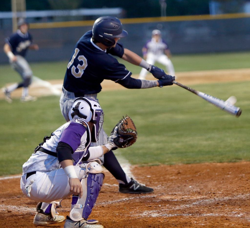 Keller's Will Lance (13) drives a bases-loaded pitch to the outfield in the third inning. Two fielding errors by Keller Timber Creek cleared the bases and allowed Lance to circle the bases and score during the District 3-6A game.  (Steve Hamm/Special Contributor)