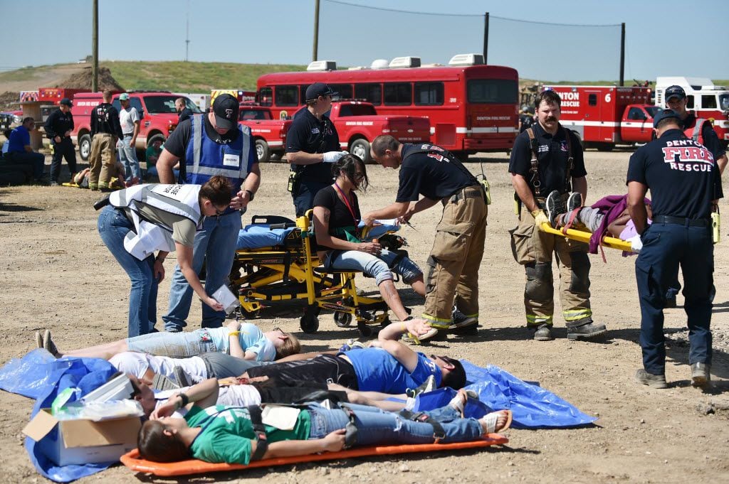 During disaster training, Denton first responders rescue mock victims  at the Denton Municipal Landfill.
