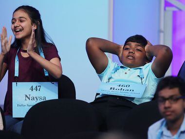 Naysa Modi (left) of Frisco and Rohan Raja of Irving react to the news that they have...