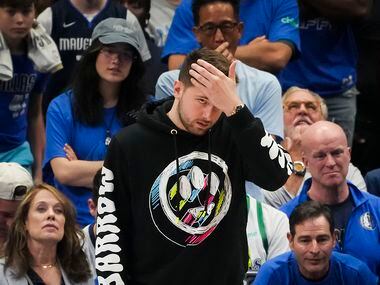 Dallas Mavericks guard Luka Doncic reacts on the bench during the second quarter in Game 1...