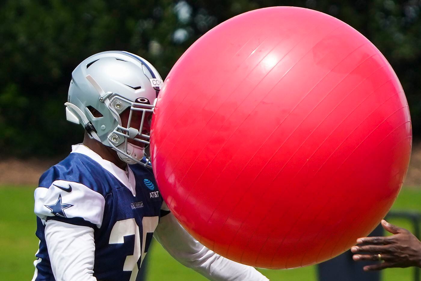 Dallas Cowboys safety Tyler Coyle works with an exercise ball in a drill during a minicamp practice at The Star on Tuesday, June 8, 2021, in Frisco. (Smiley N. Pool/The Dallas Morning News)