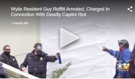 Guy Reffitt confronts Capitol Police on the stairs of the U.S. Capitol on Jan. 6.