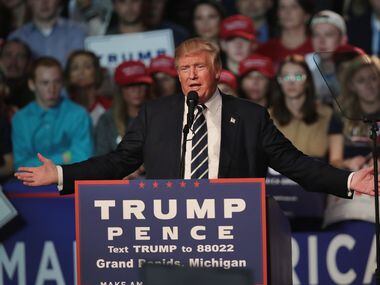 GRAND RAPIDS, MI - NOVEMBER 08:  Republican presidential nominee Donald Trump addresses...