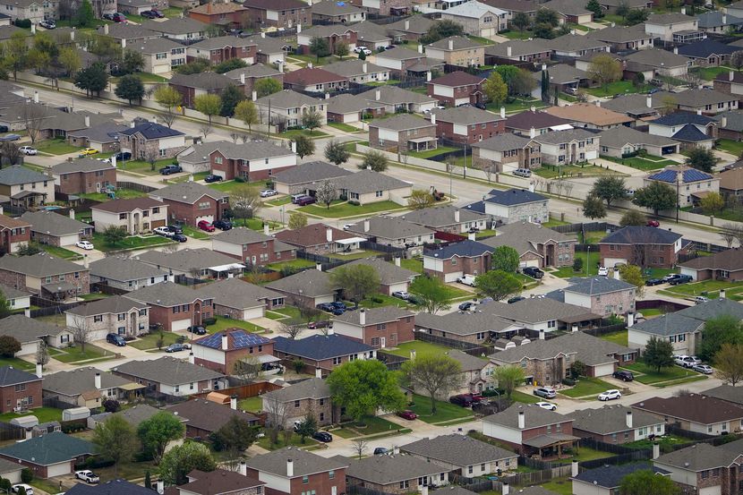 A March 2020 aerial view of homes in Grand Prairie, whose real estate market is growing...
