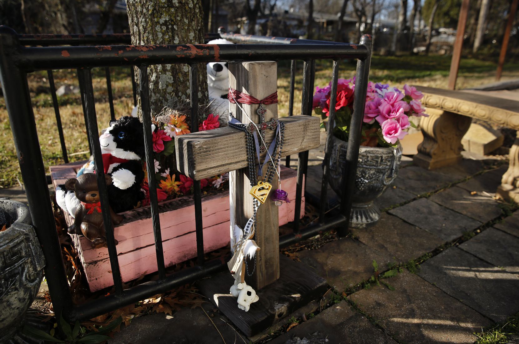 A memorial for Amber Hagerman, the little girl who was abducted on her bike and later found dead in Arlington in 1996, has accumulated near the crime site as the 25th anniversary of the cold case crime nears. Because of this case, the Amber Alert was created to ask the public for help in finding abducted children. (Tom Fox/The Dallas Morning News) 