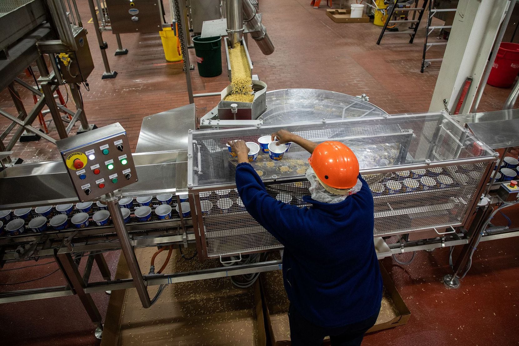 Phillis Knight works on the production line of Easy Mac Macaroni & Cheese Cups at the Kraft...