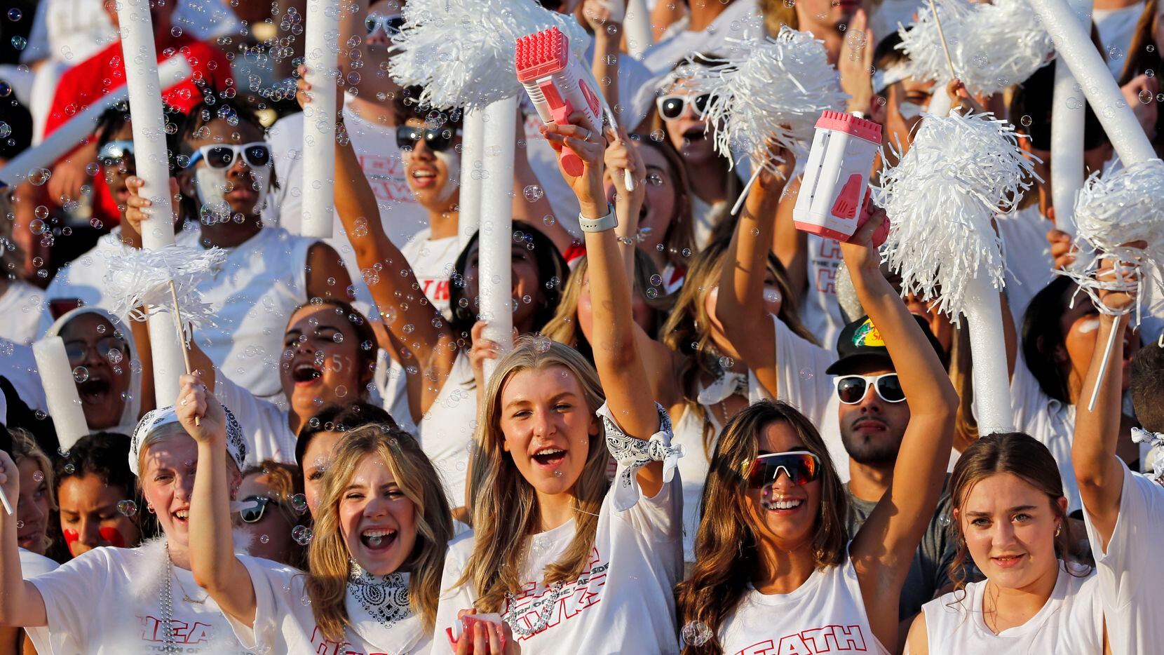 Rockwall-Heath high fans cheer in the stands, using bubble-making machines, during the first...