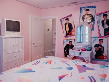 Posters of the beloved boy band New Kids on the Block surround the vanity in one of the bedrooms at The Slater.