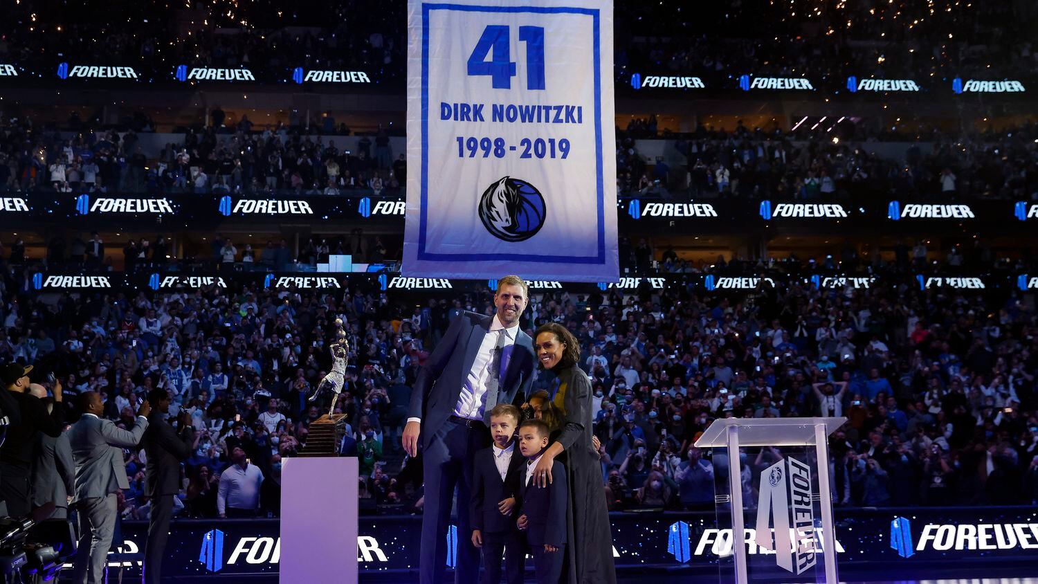 Former Dallas Mavericks All-Star Dirk Nowitzki, his wife Jessica Olsson and their kids pose...