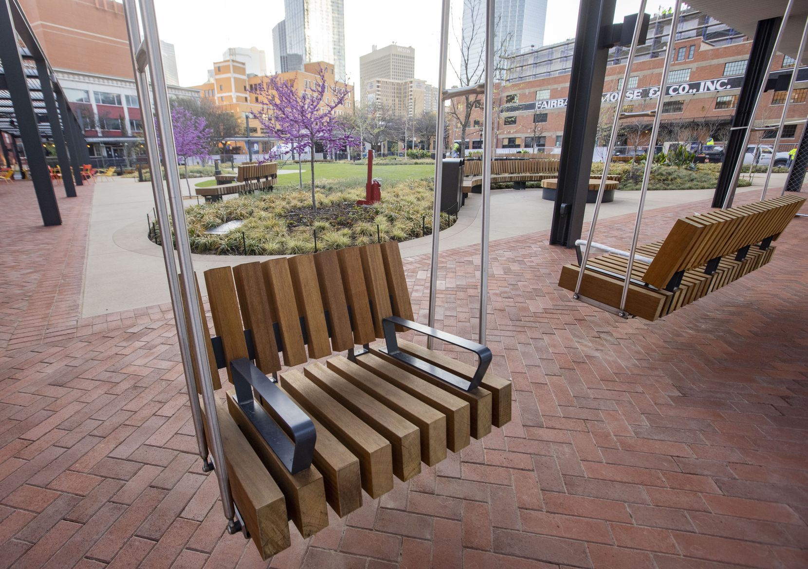 Porch swings at the West End Square park in Dallas on Friday, March 19, 2021. 