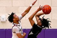Denton Guyer guard Mason White (right) tries to get off a tough shot over Lewisville guard...