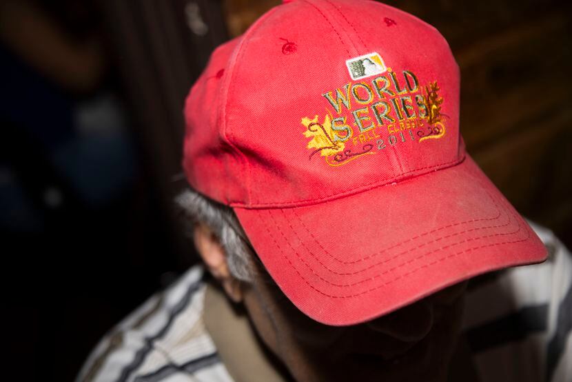 Gene Goodell wears a 2011 World Series hat during lunch at J. Gilligan's Bar & Grill in...