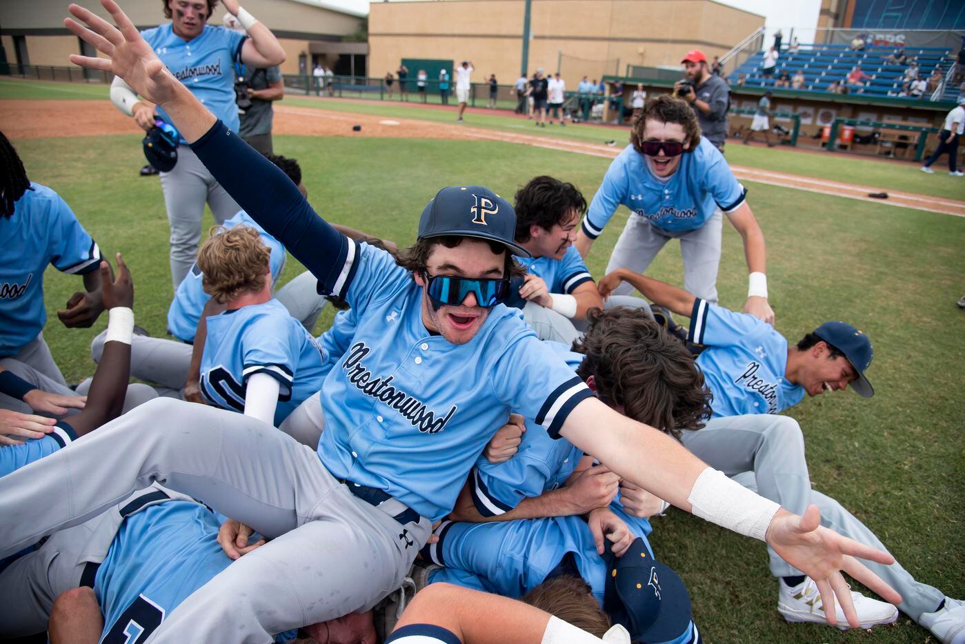 Prestonwood players celebrate after making the final out to win the TAPPS Division I...