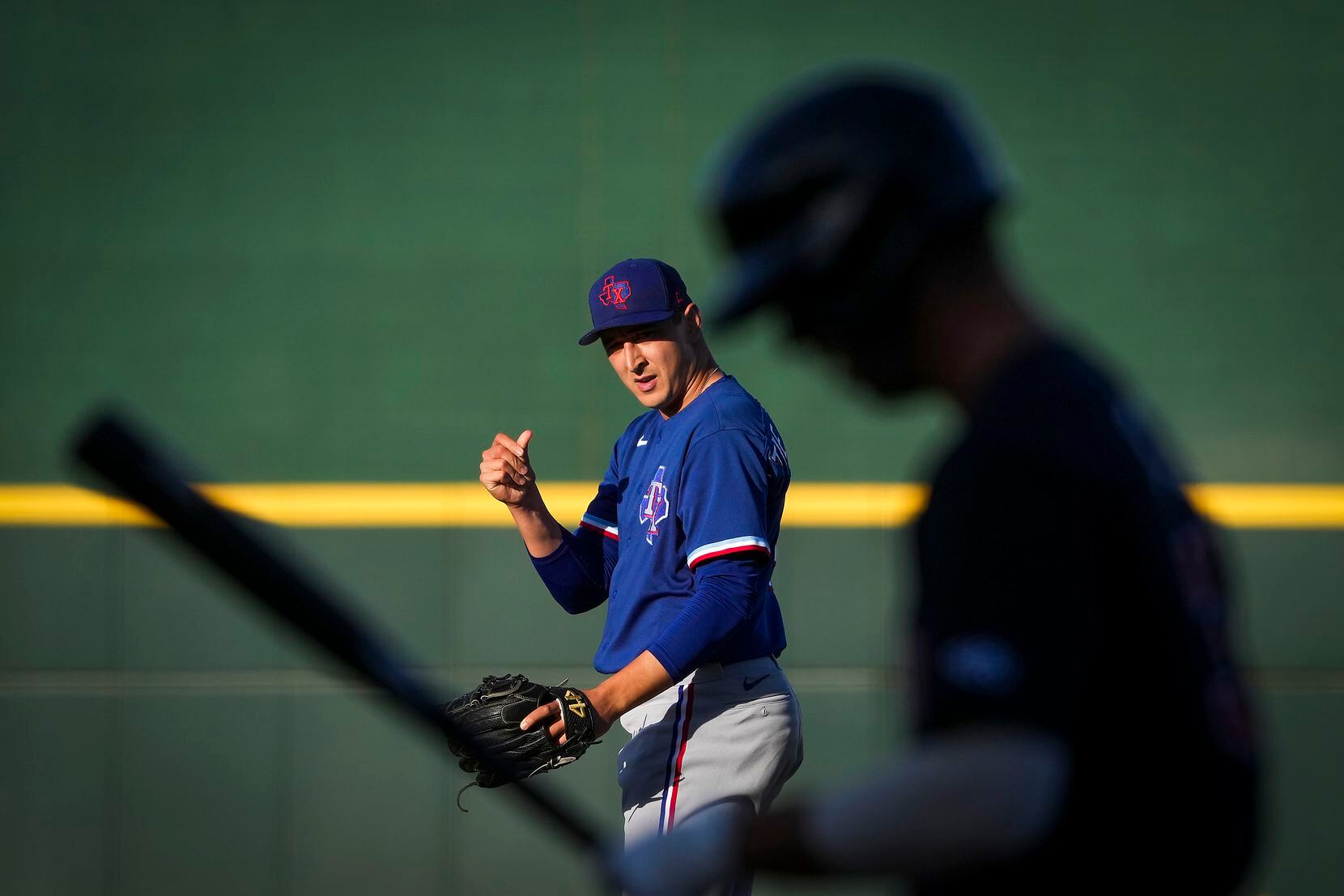 Texas Rangers Tai Tiedemann pitches during the ninth inning of a spring training game...