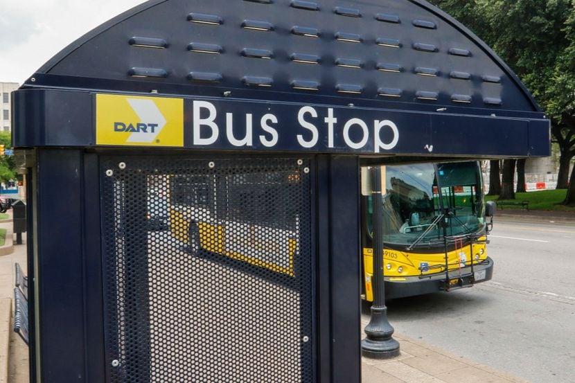 A covered DART bus stop and bus at Union Station in downtown Dallas, photographed Monday...