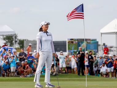Professional golfer Jin Young Ko reacts after making the winning putt on the No. 18 green...