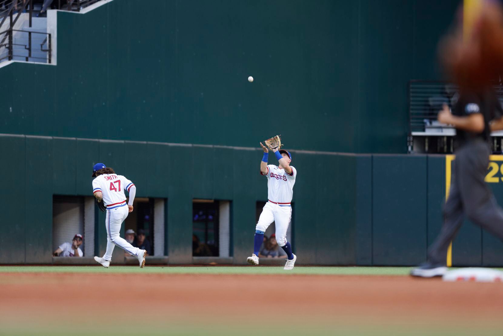 Texas Rangers third baseman Josh Jung (6) catches a fly ball for an out as Texas Rangers...