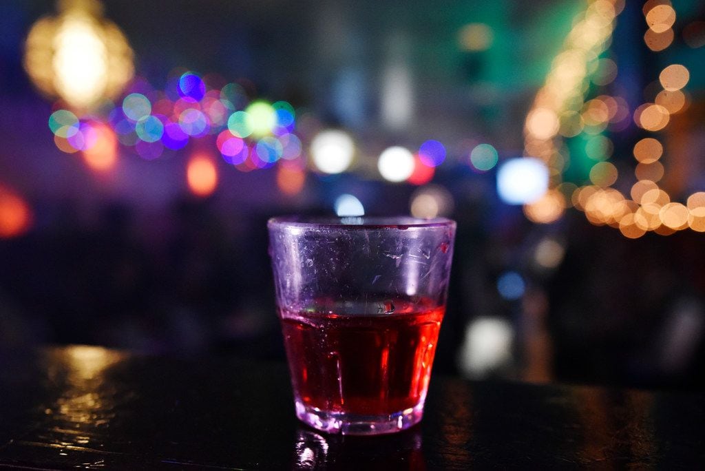 Ooooh yea shots, made with vodka, melon, amaretto and cranberry, served at the Drunken Clam,...
