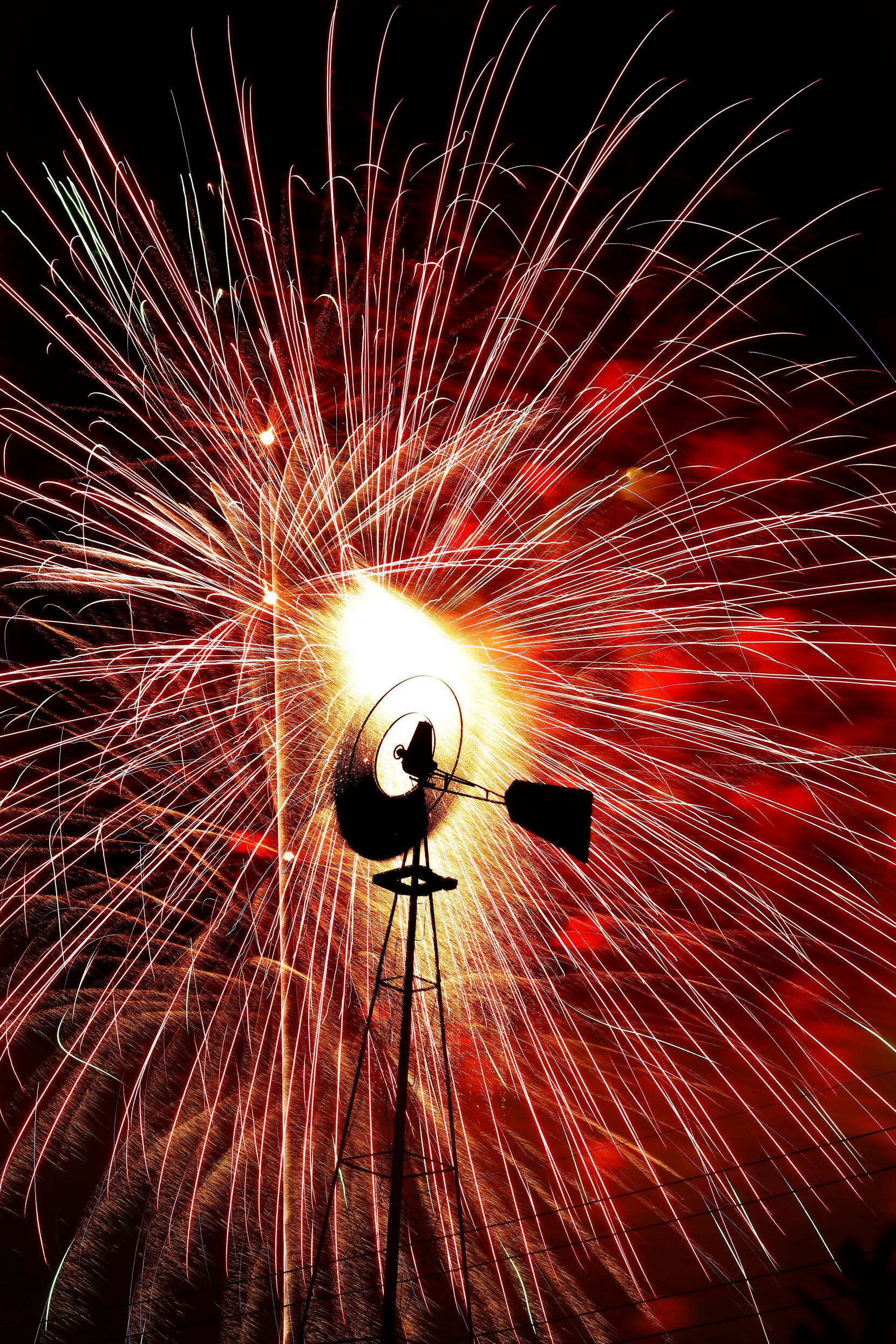 Fireworks exploded over a spinning windmill on July 3 at Addison’s Kaboom Town festival....