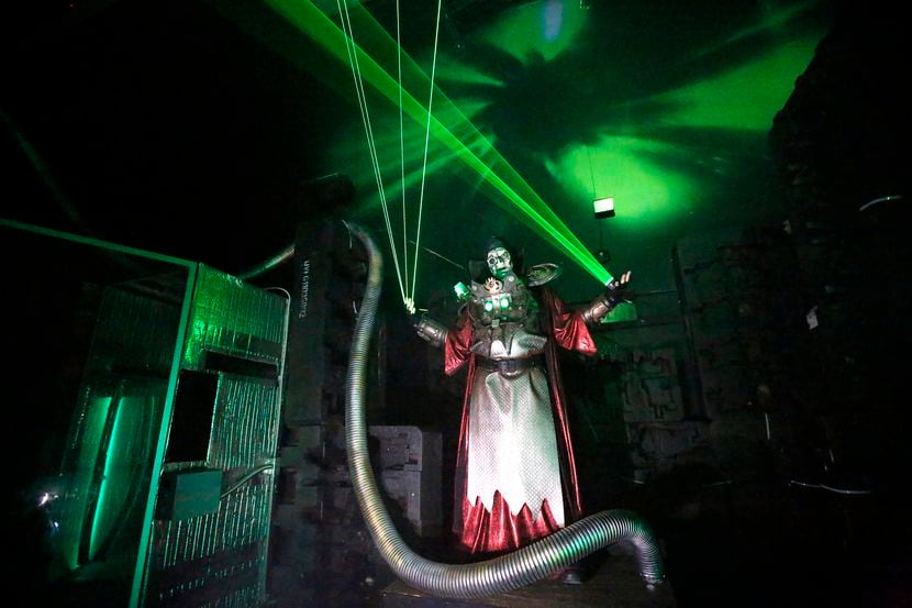 An actor performs during the Dark Hour Haunted House in Plano in 2017.