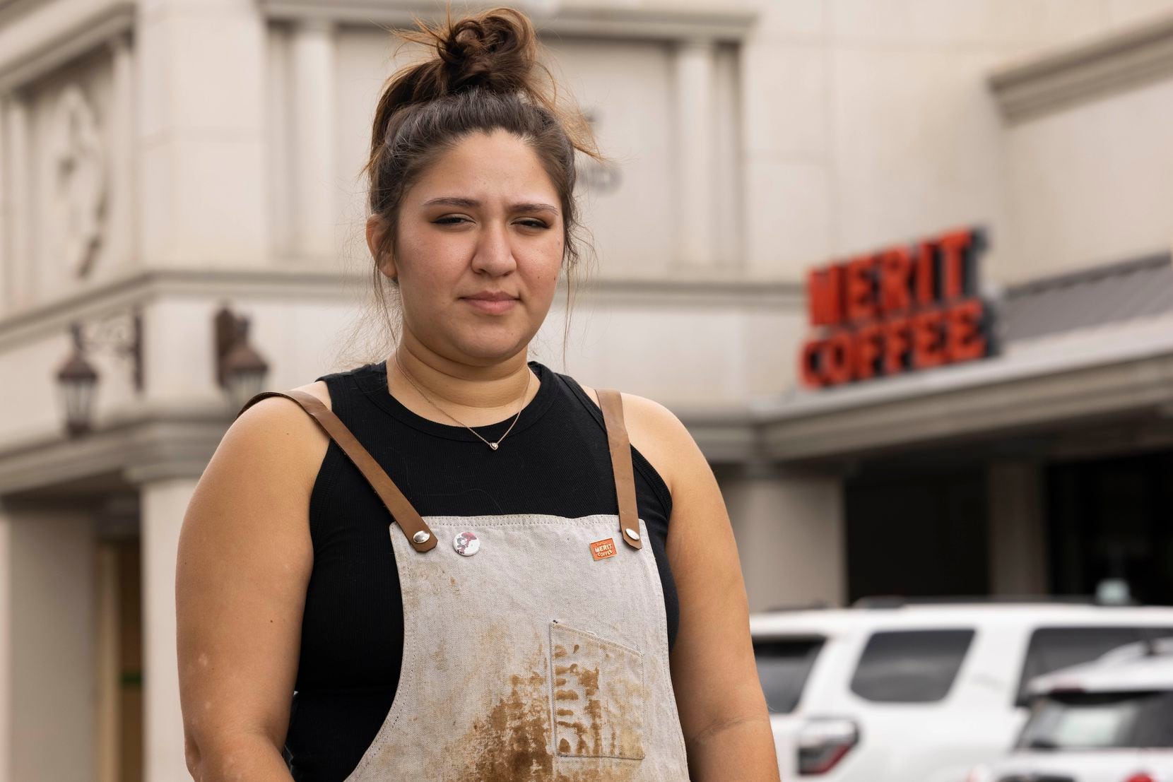 Jacqueline Farias, a barista with student debt, poses outside of her work on Sept. 1, 2022,...