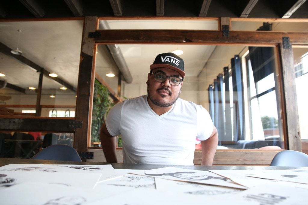 Arturo Torres, a local Dallas artist, poses for a photograph at Common Desk in the Oak Cliff...