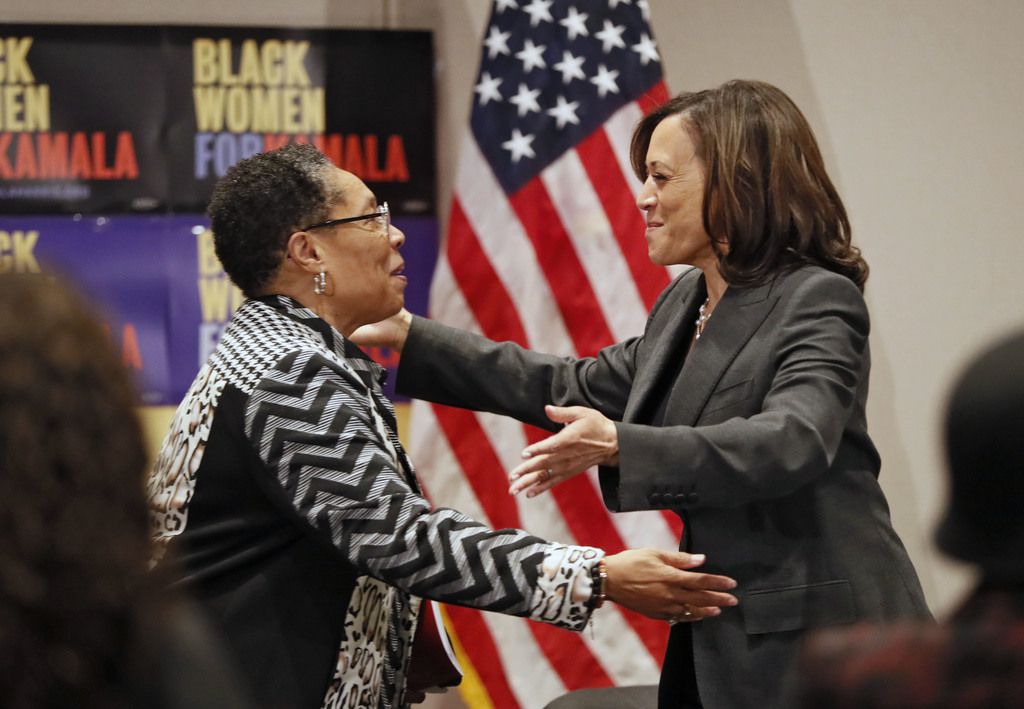 Sen. Kamala Harris is welcomed by U.S. Rep. Marci Fudge, left, as she headlined a Black...