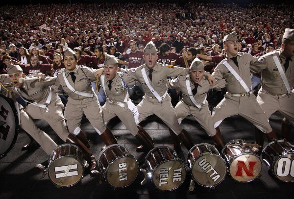 Texas A&M Aggies Cadet Corps drummers sing the Aggie War Hymn before facing the Nebraska...