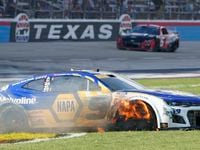 Chase Elliott's tire burns after he contacted the wall during the NASCAR Cup Series auto...